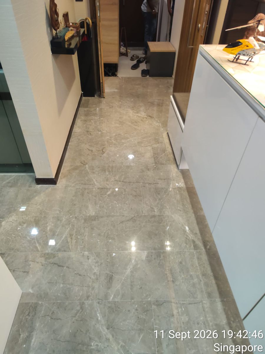 Polished grey marble along a kitchen corridor