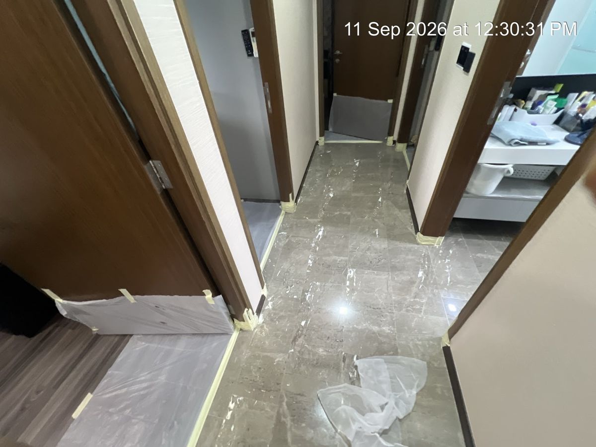 Bedroom doorways taped off during marble polishing