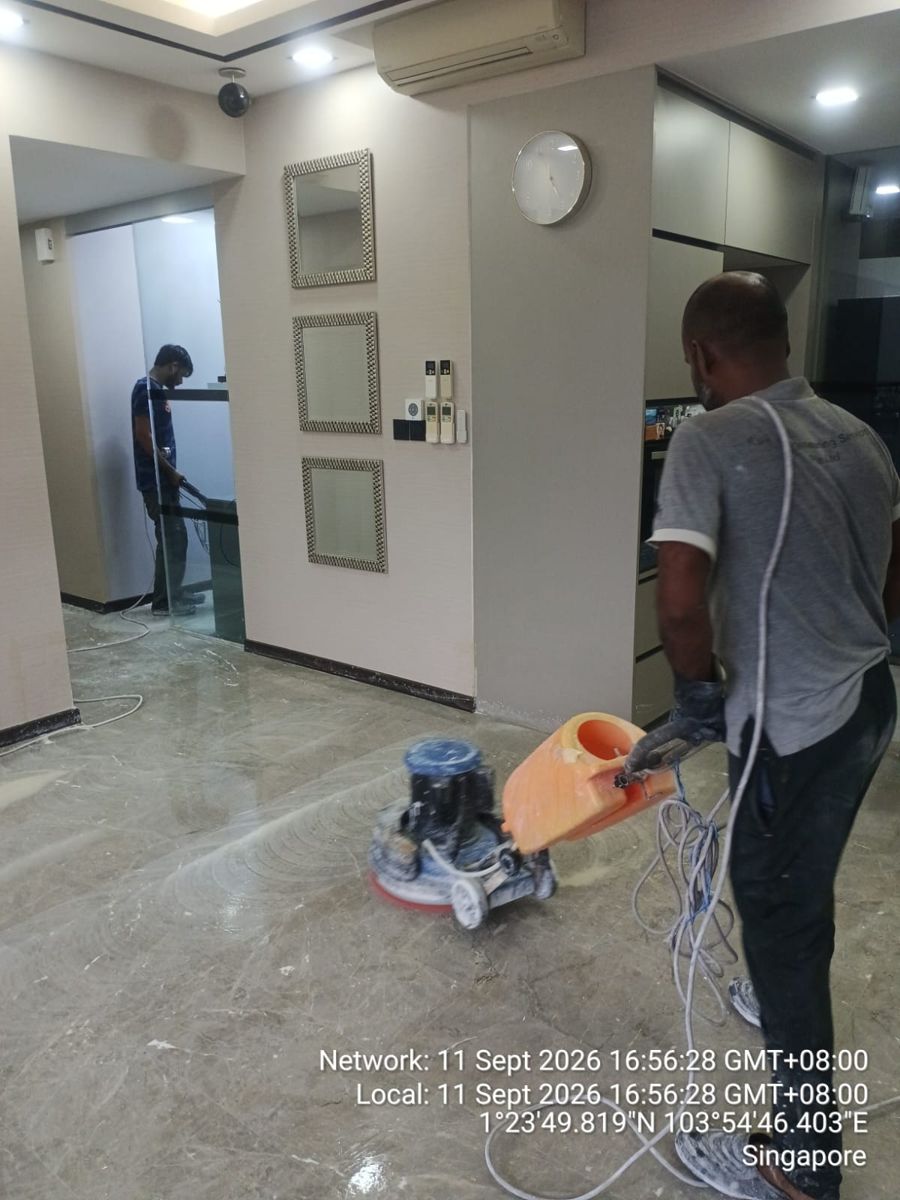 Marble polishing machine in use in a living room